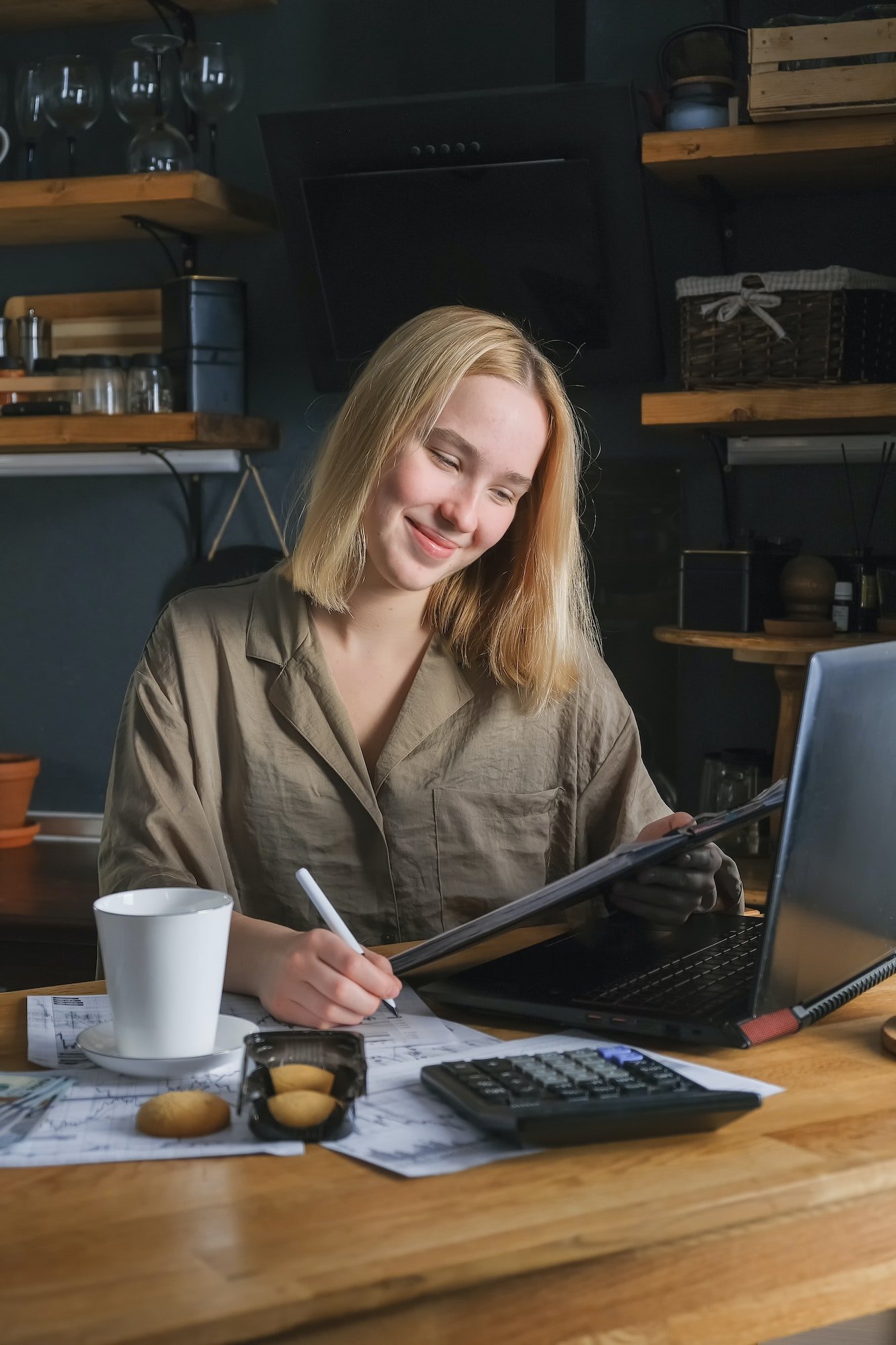 Investments. Young woman investor buys stocks on the stock exchange stock market from home