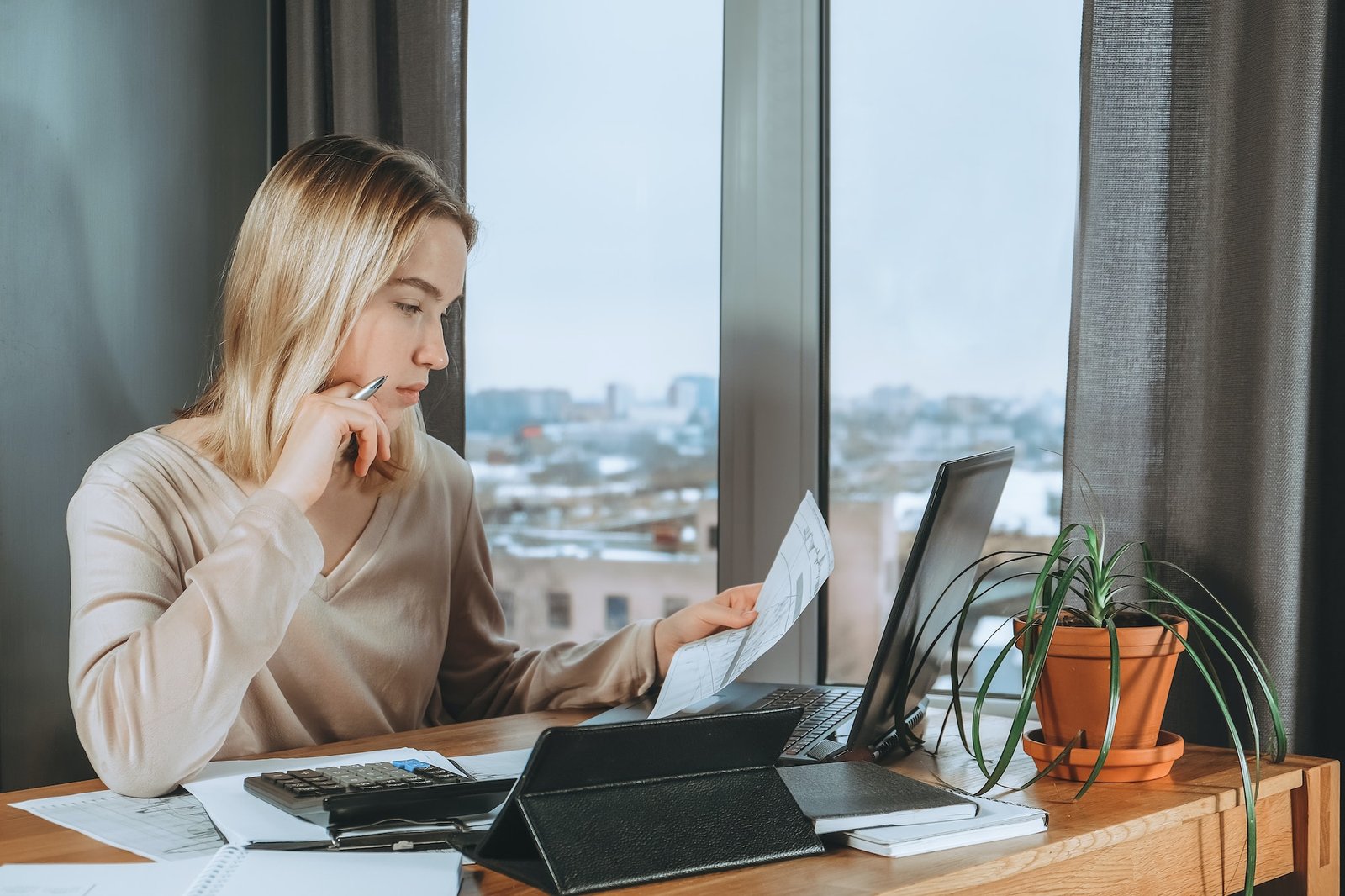 Investments. Young woman investor buys stocks on the stock exchange stock market