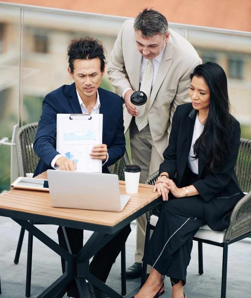 Business team discussing finance data