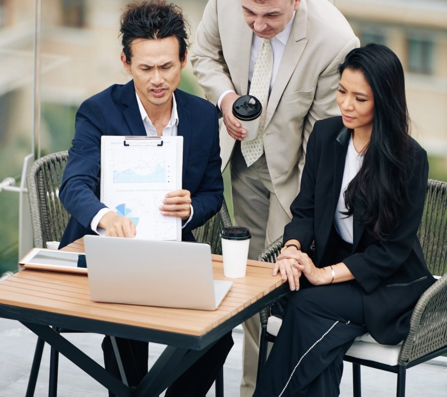 Business team discussing finance data
