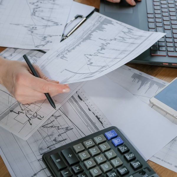 Investments. Young woman investor buys stocks on the stock exchange stock market Investments. Young woman investor buys stocks on the stock exchange stock market
