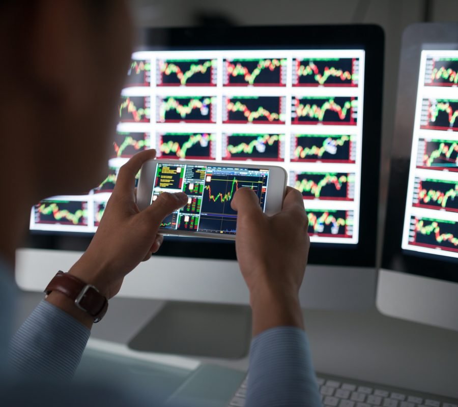 Man using stock market application
