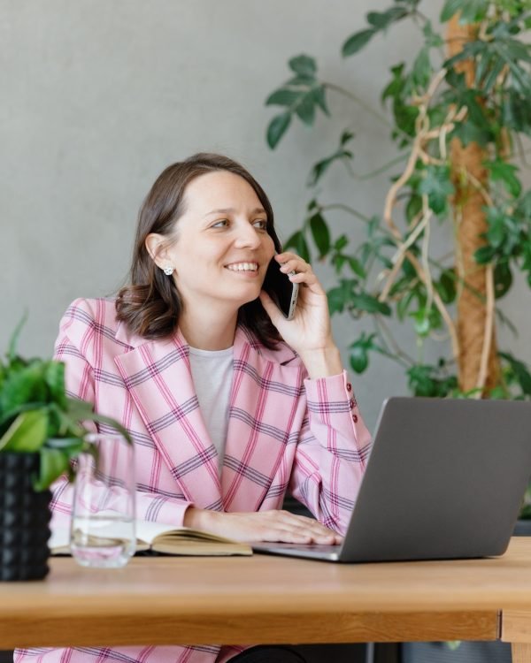 young and beautiful European woman in the office business and finance.