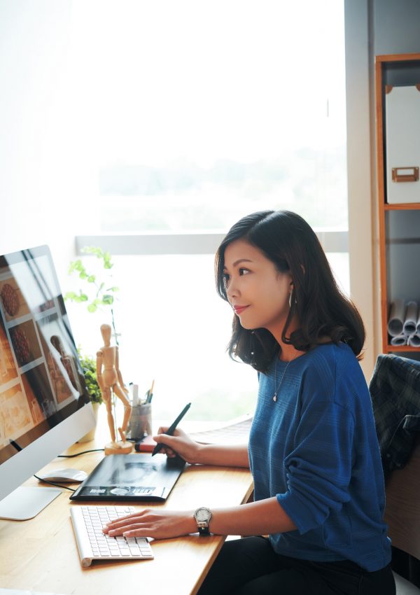 Young Woman Working With Stock Photos